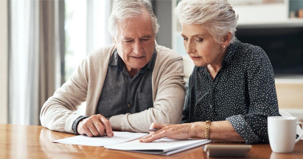 Is Life Insurance Taxable Older Couple Reviewing Finances