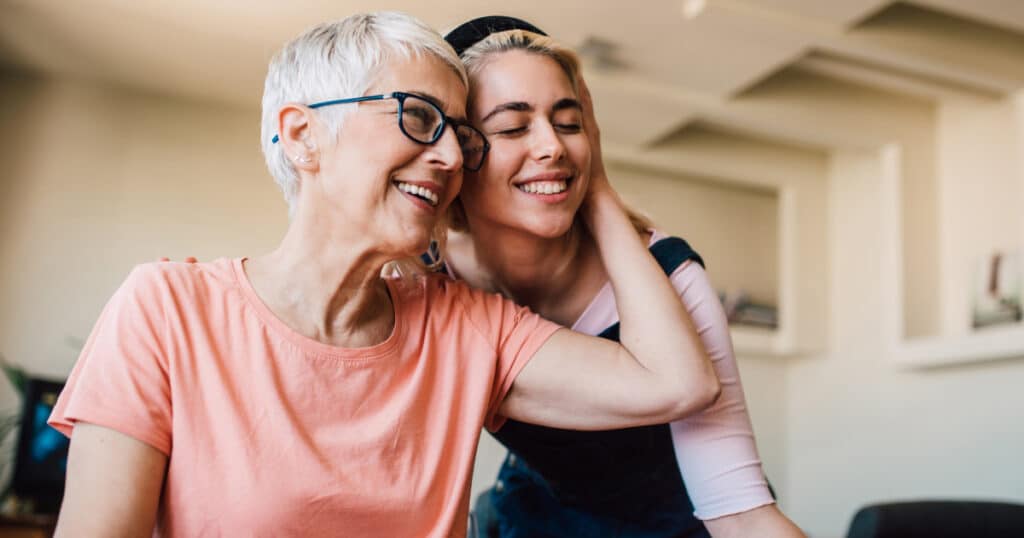 Mother and daughter embrace